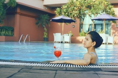 Swimming Pool & Pool Bar at Redtop Hotel & Convention Center in Jakarta, Indonesia
